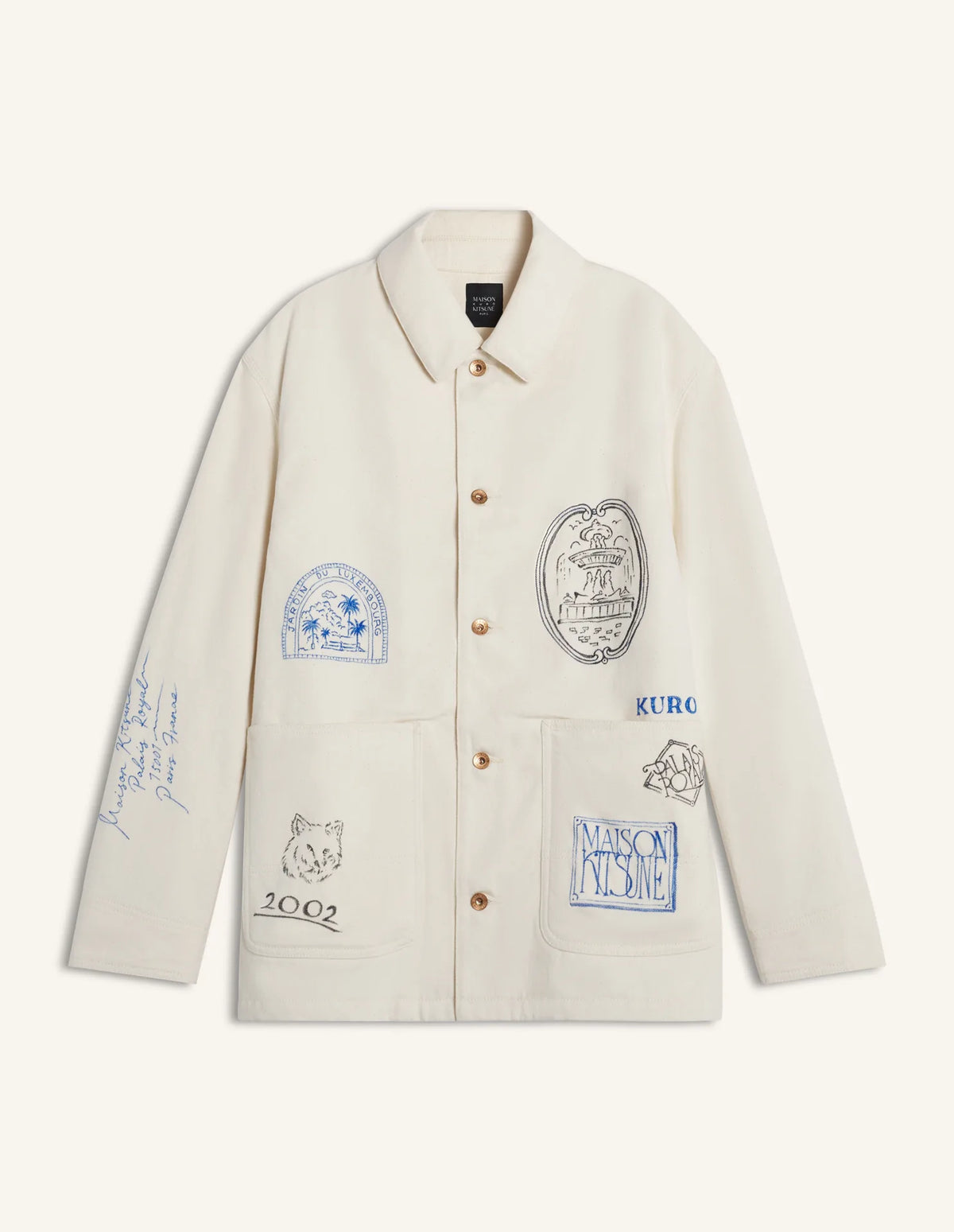 An ecru denim work jacket embroidered with hand-drawn Paris landmarks and the Kitsuné fox